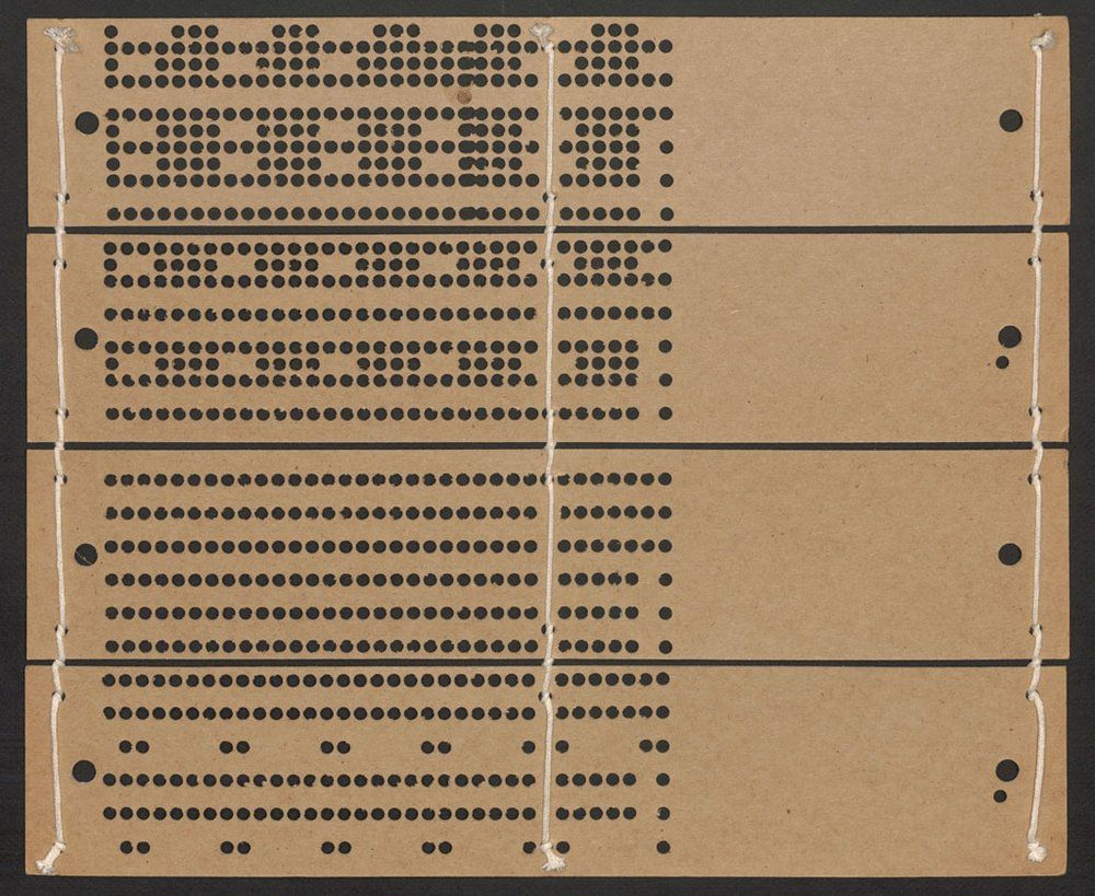 Jacquard loom punch card (~1800)